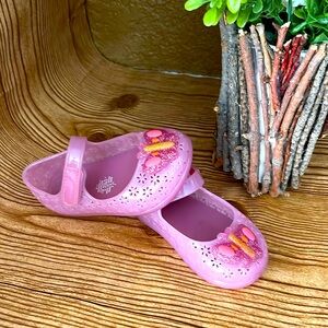 Pink with a butterfly shoes size 5